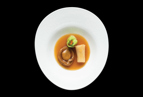 Braised whole South African abalone, bamboo piths roll stuffed with shrimp mousse in abalone sauce