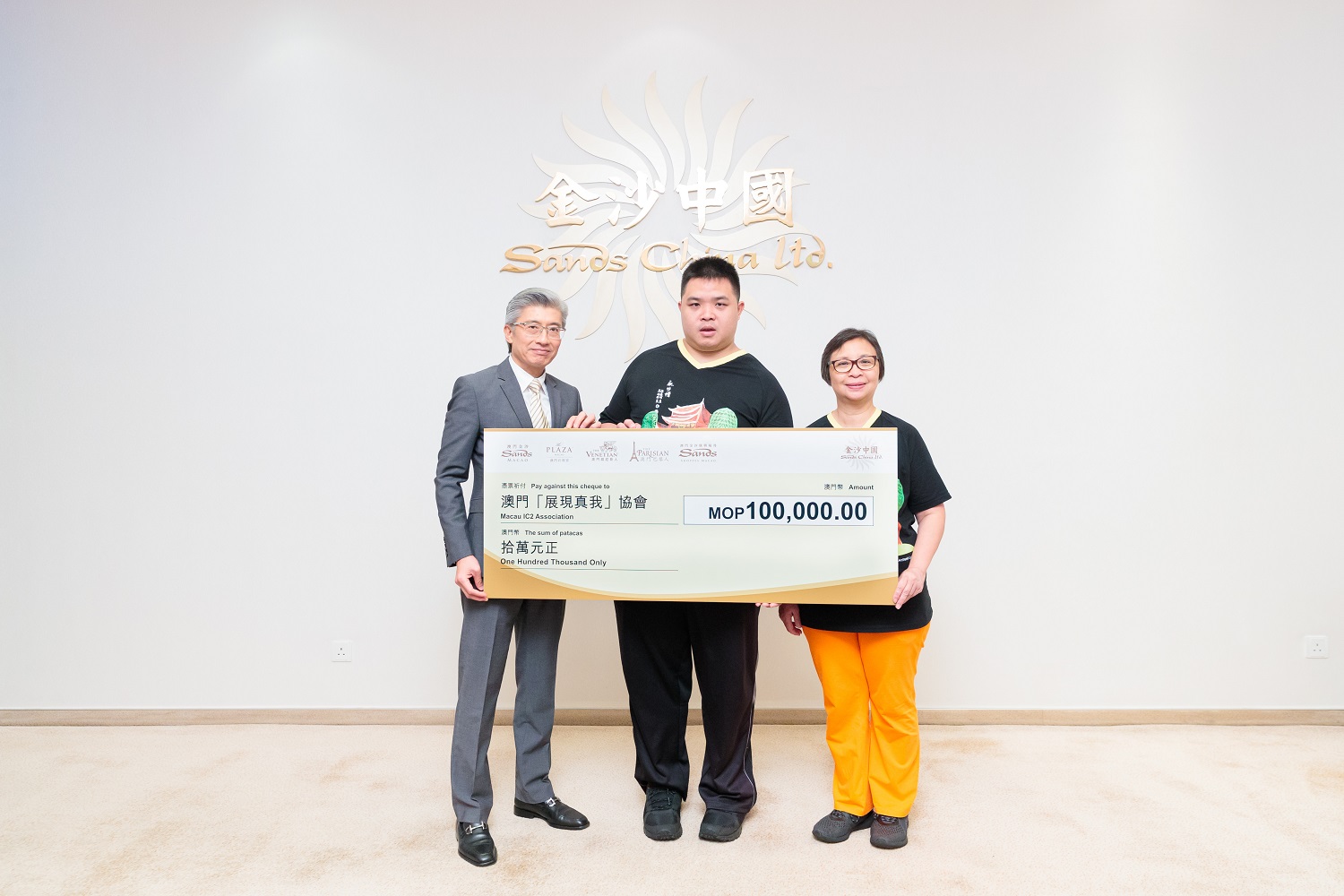 Sands China Presents Light the Night Run Donation Cheques 